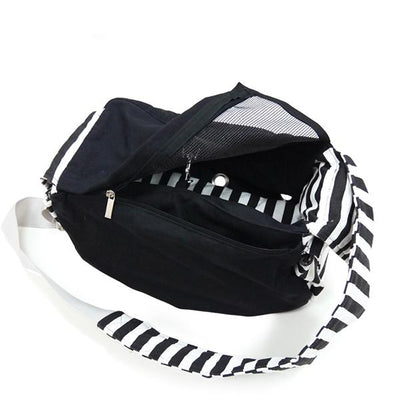 Soft Sling Dog Carrier in Black | Pawlicious & Company